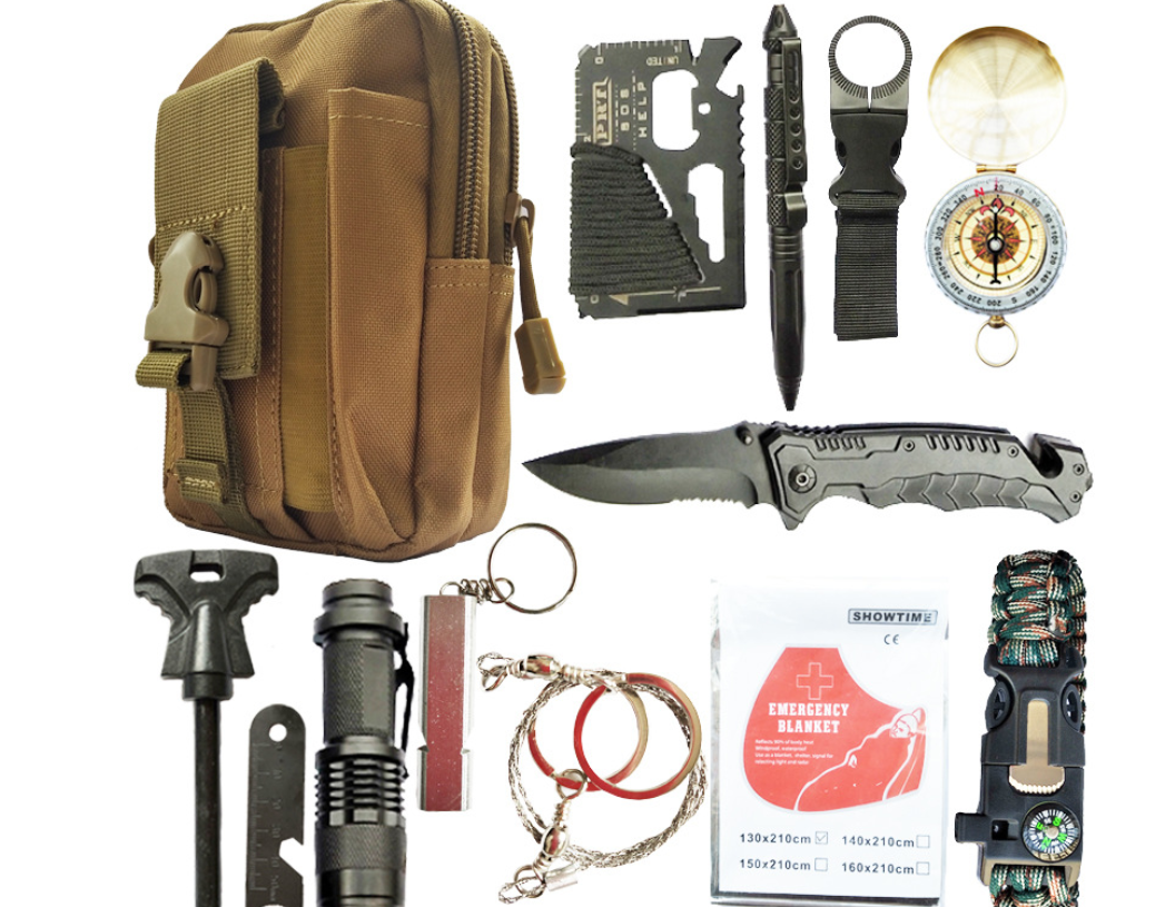 Contenido completo del kit de supervivencia mostrando suministros de primeros auxilios